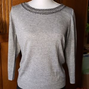Elegant grey beaded sweater